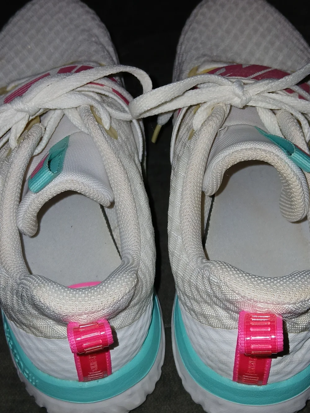 Nike Women’s White Athletic Sneakers with Pink Accents